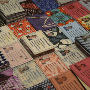 Nguyen Thi Thanh Mai, 'ID Card', 2014, 340 heat transfer prints on recycled fabric on a table, 5.7 x 7.9 cm. Image from Artsy